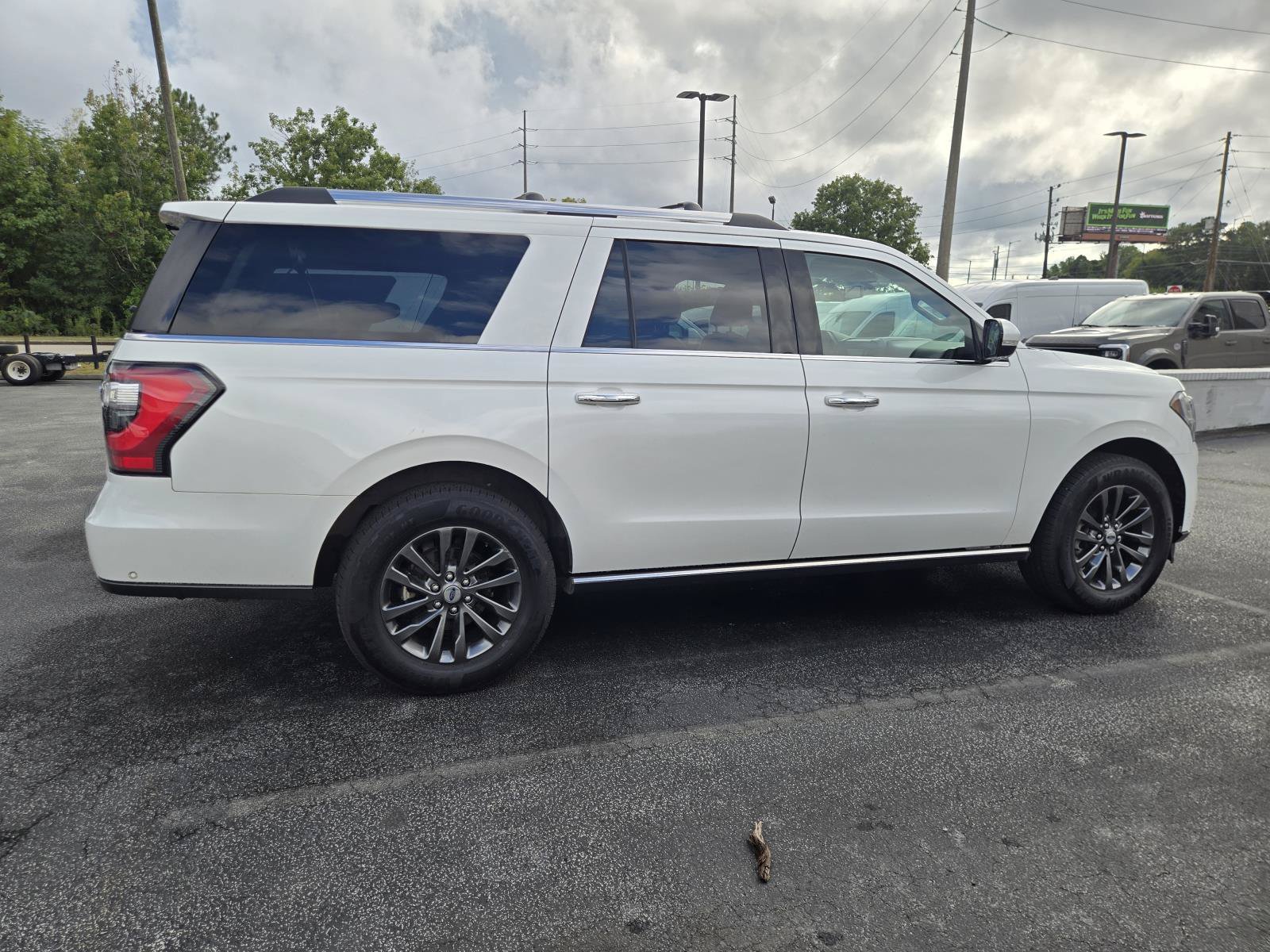 Used 2021 White Metallic Ford Limited image 4