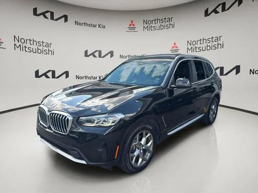 Used 2024 Black BMW xDrive30i image 1