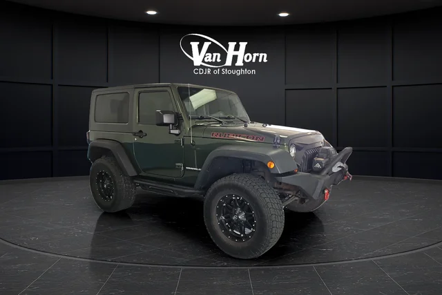 Used 2009 Green Metallic Jeep Rubicon image 1