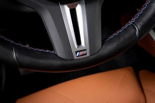 Used 2025 Black Sapphire Metallic BMW M60i image 45