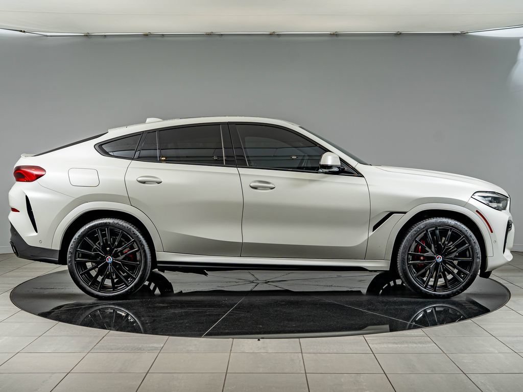 Used 2023 Frozen Brilliant White Metallic BMW M50i image 4