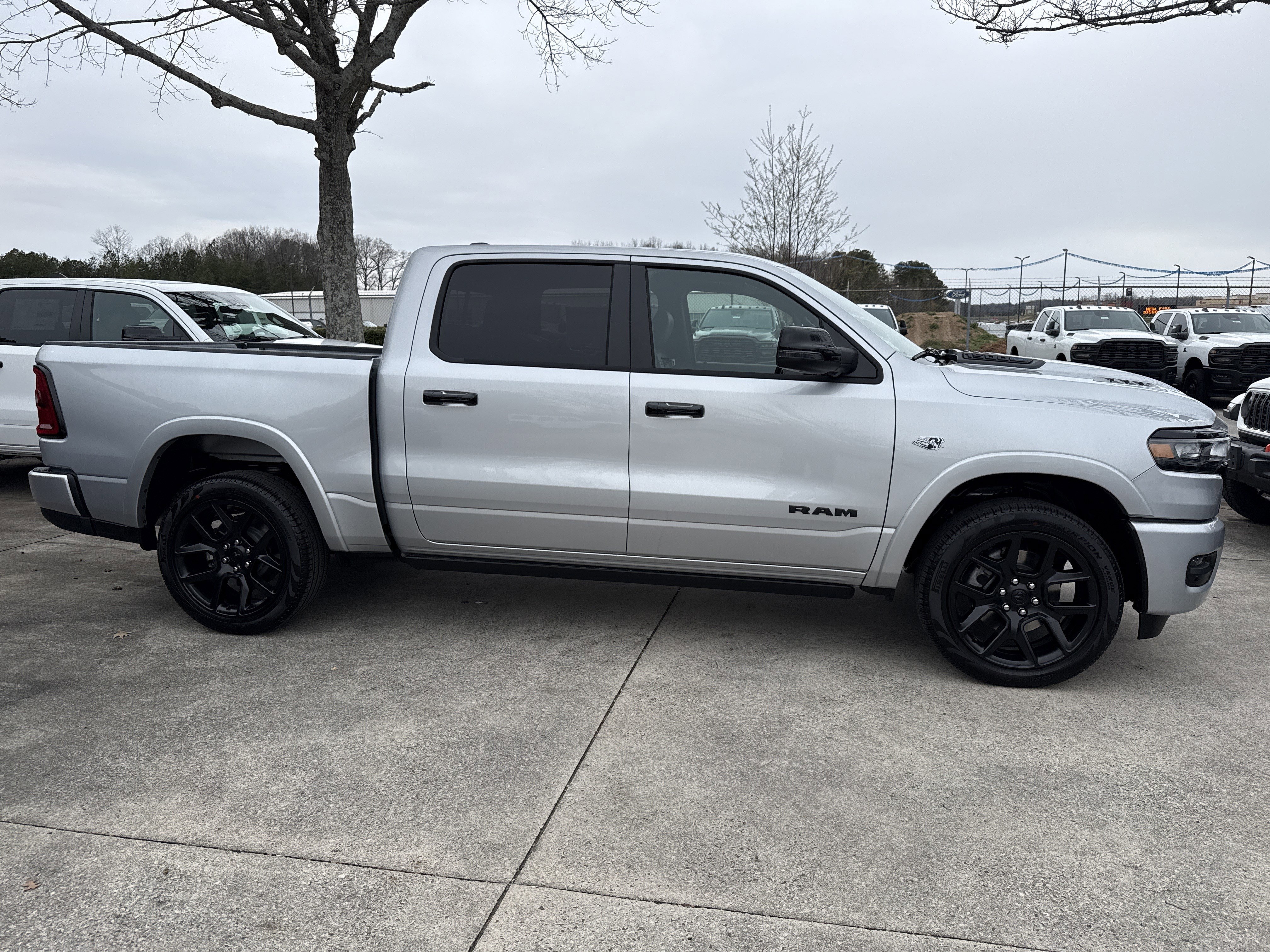 New 2026 Silver Zynith Exterior Paint RAM Laramie image 8