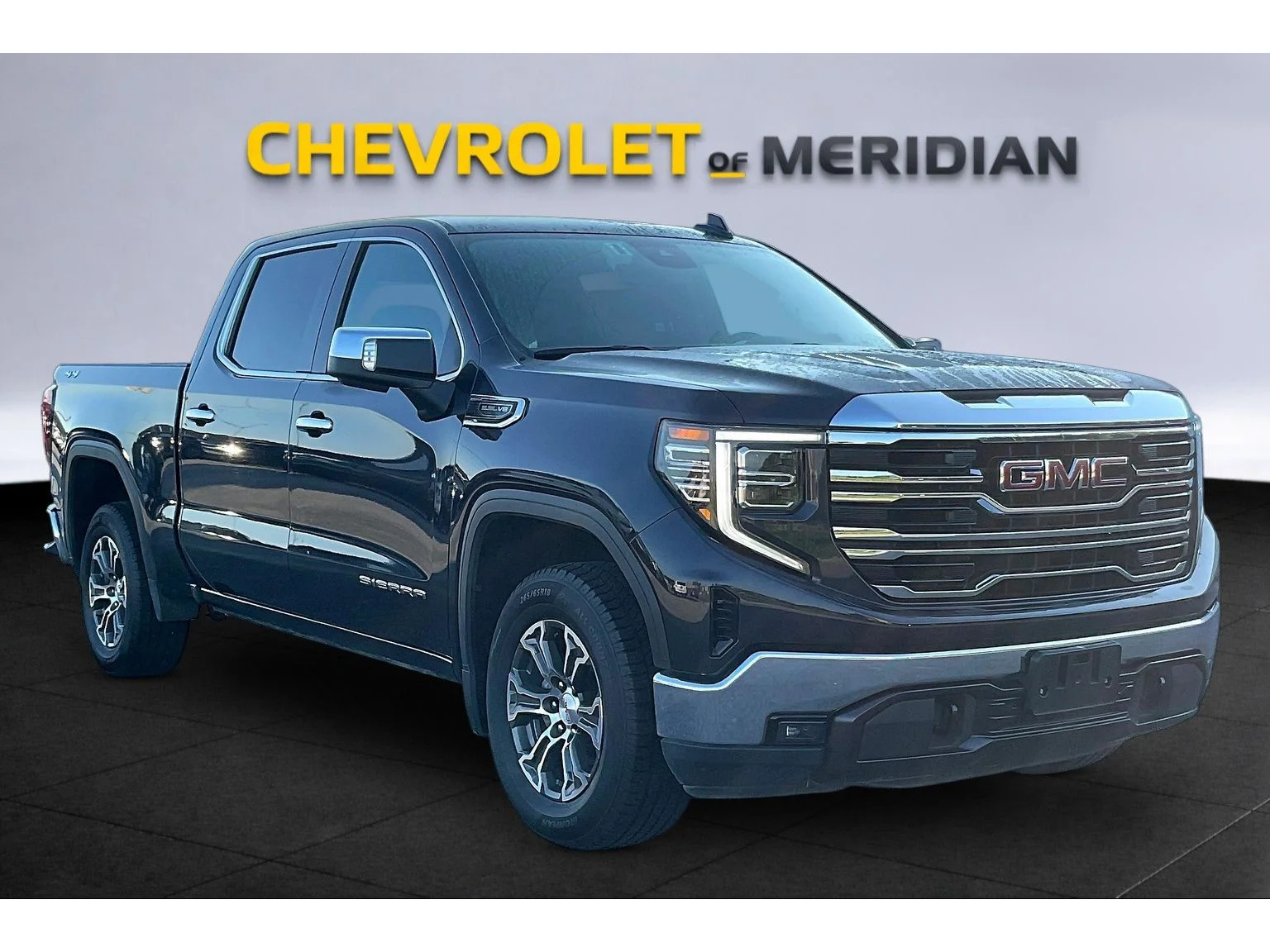 Used 2025 Titanium Rush Metallic GMC SLT image 1
