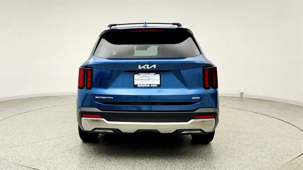 Used 2025 Mineral Blue Kia EX AWD image 6