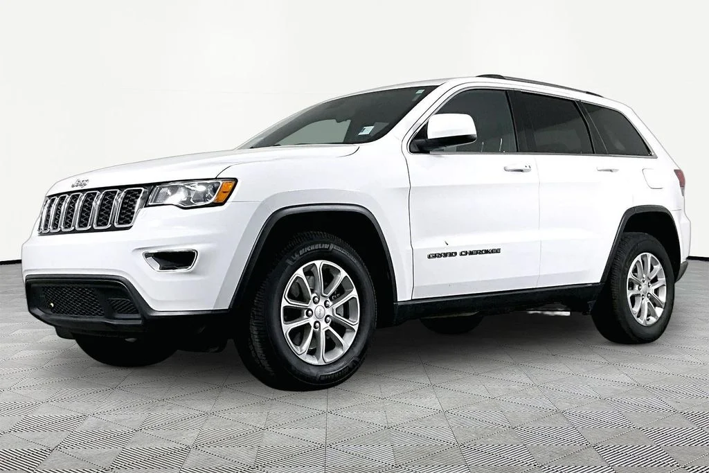Used 2021 White Jeep Laredo E image 1