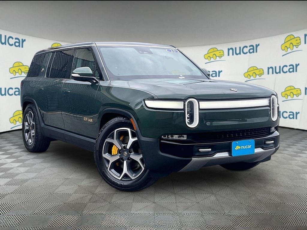 Used 2023 Green Rivian Adventure image 1