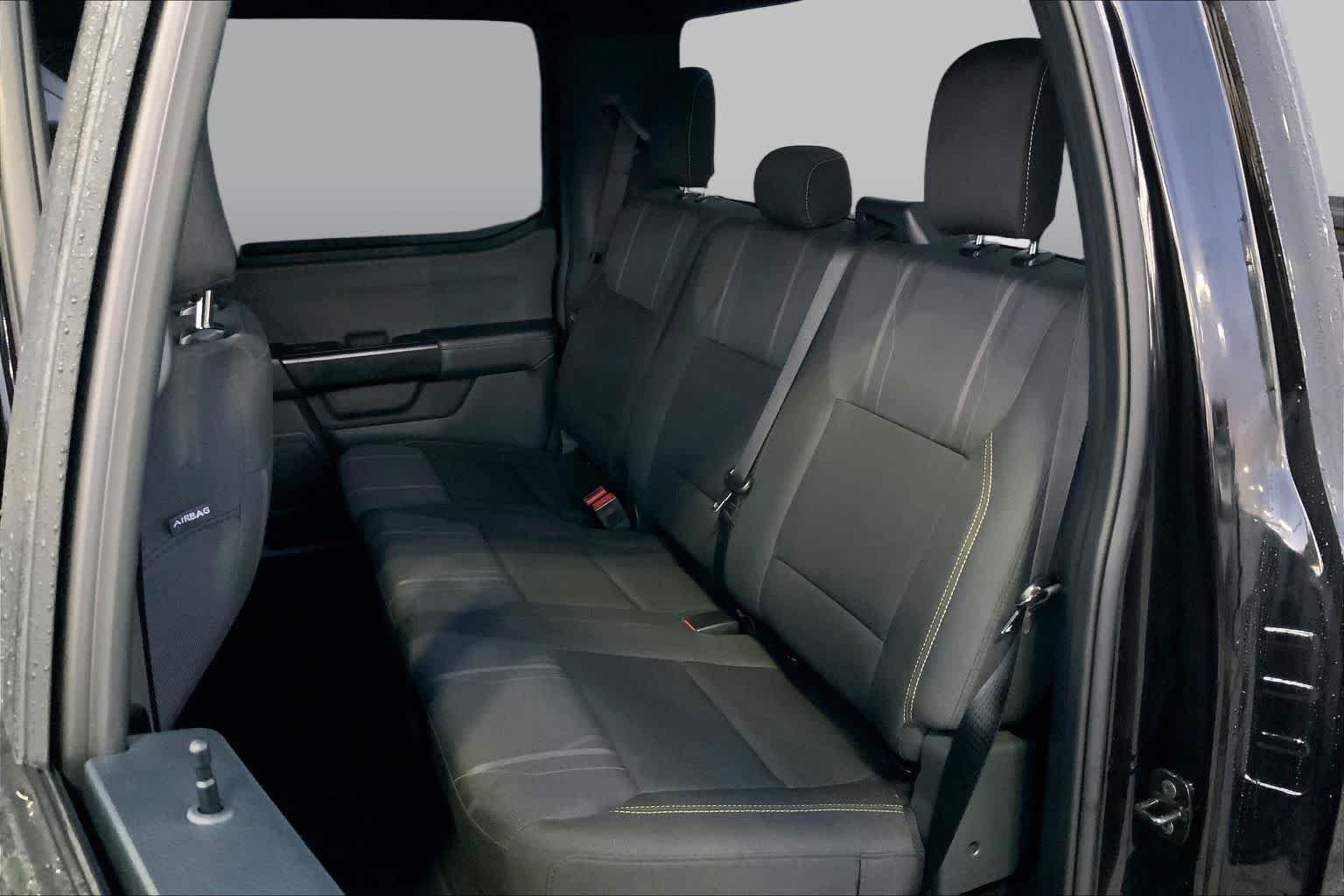 Used 2025 Agate Black Metallic Ford STX image 19