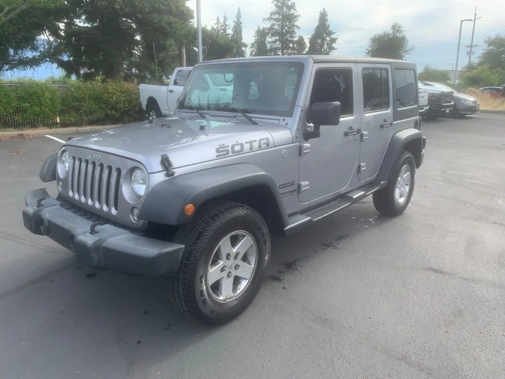 Used 2018 Billet Silver Metallic Clearcoat Jeep Unlimited Sport image 1