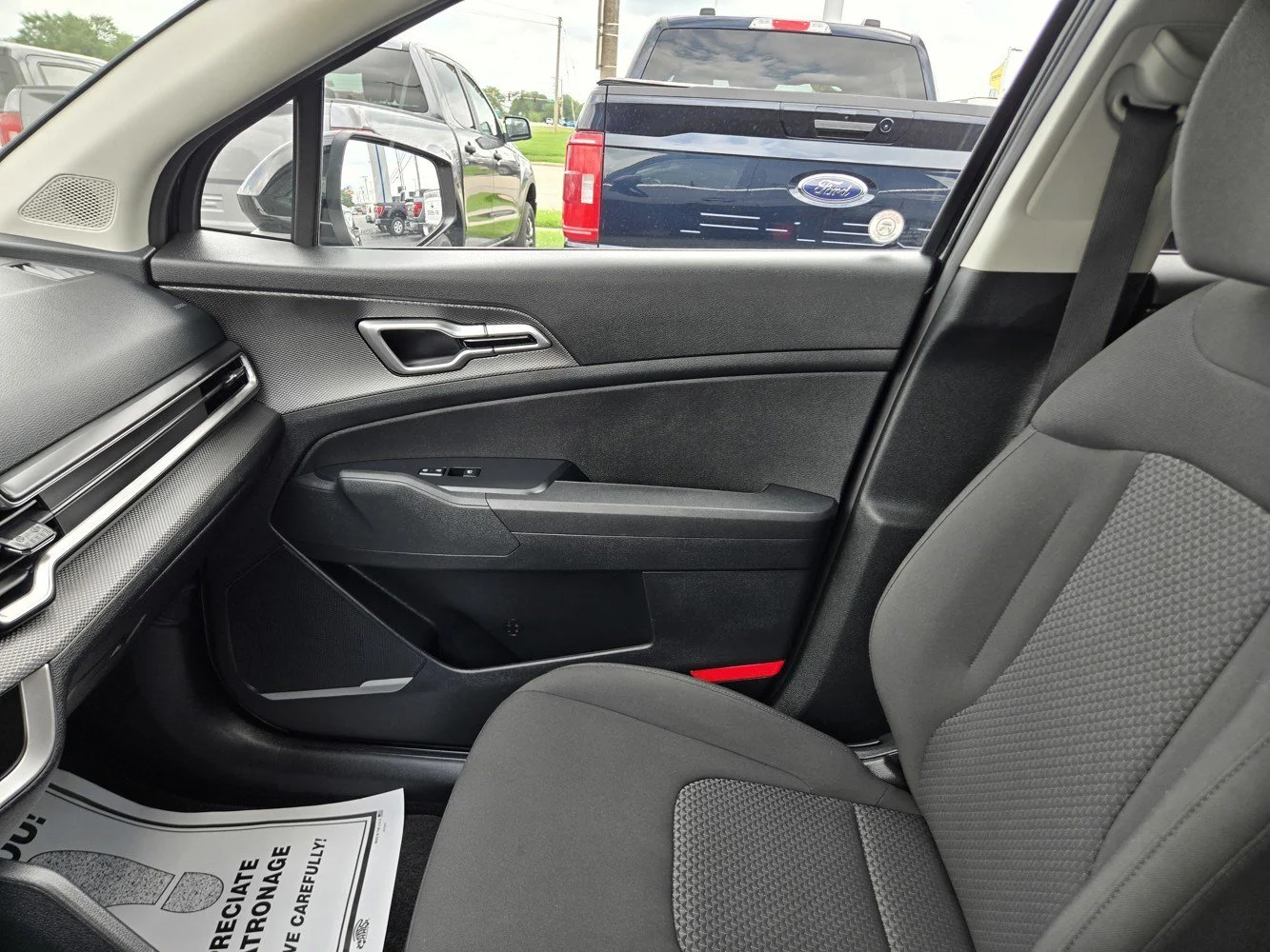 Used 2025 Ebony Black Kia LX image 15