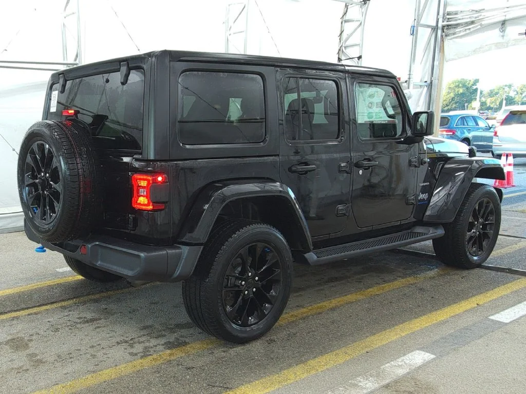 Used 2023 Black Jeep Sahara 4xe image 2