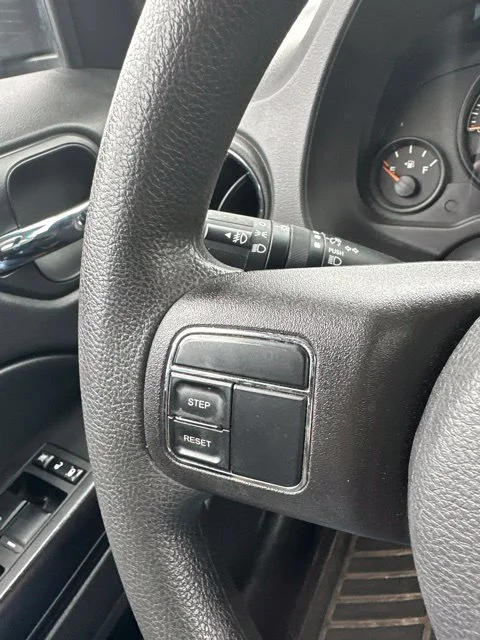 Used 2015 Granite Crystal Clearcoat Metallic Jeep Sport image 18