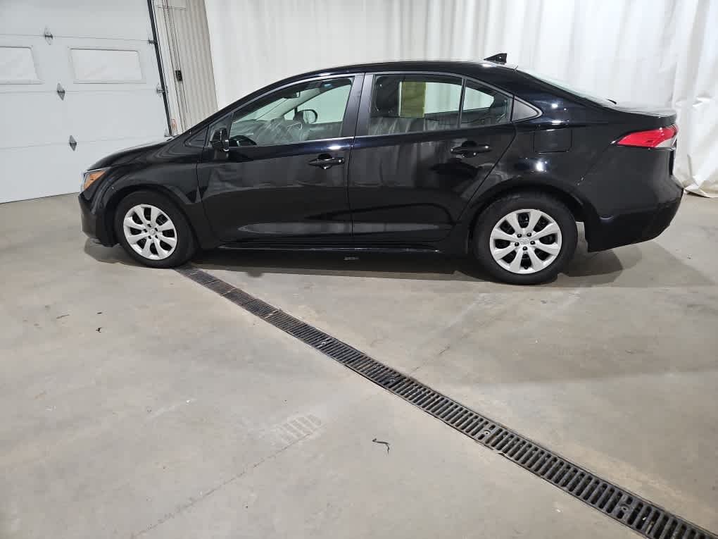 Used 2024 Midnight Black Metallic Toyota LE image 3