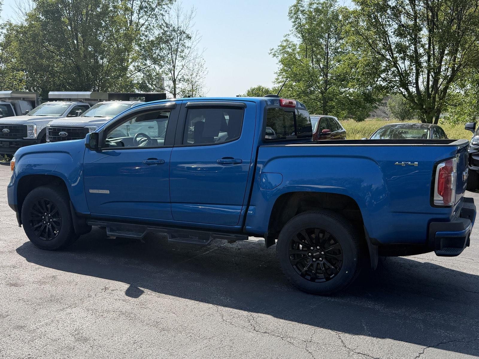 Used 2022 Dynamic Blue Metallic GMC 4WD Elevation image 5