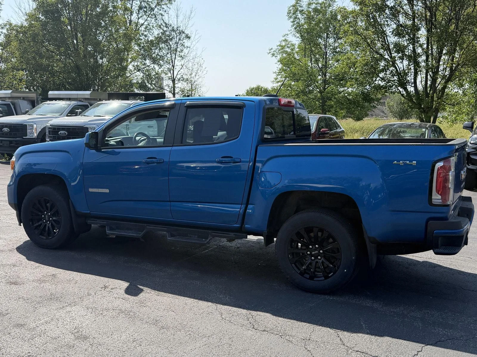 Used 2022 Dynamic Blue Metallic GMC 4WD Elevation image 5