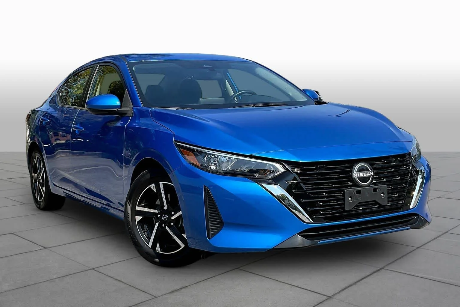 Used 2025 Electric Blue Metallic Nissan SV image 3