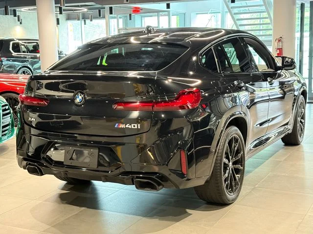 Certified Used 2024 Black Sapphire Metallic BMW M40i image 4