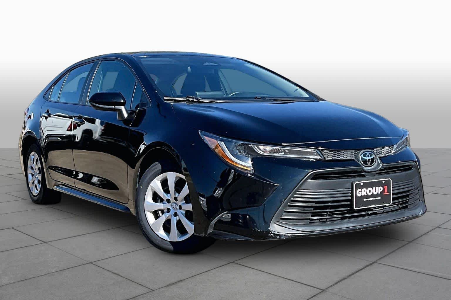 Used 2025 Midnight Black Metallic Toyota LE image 3