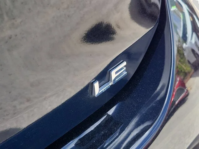 Used 2024 Black Toyota LE image 32