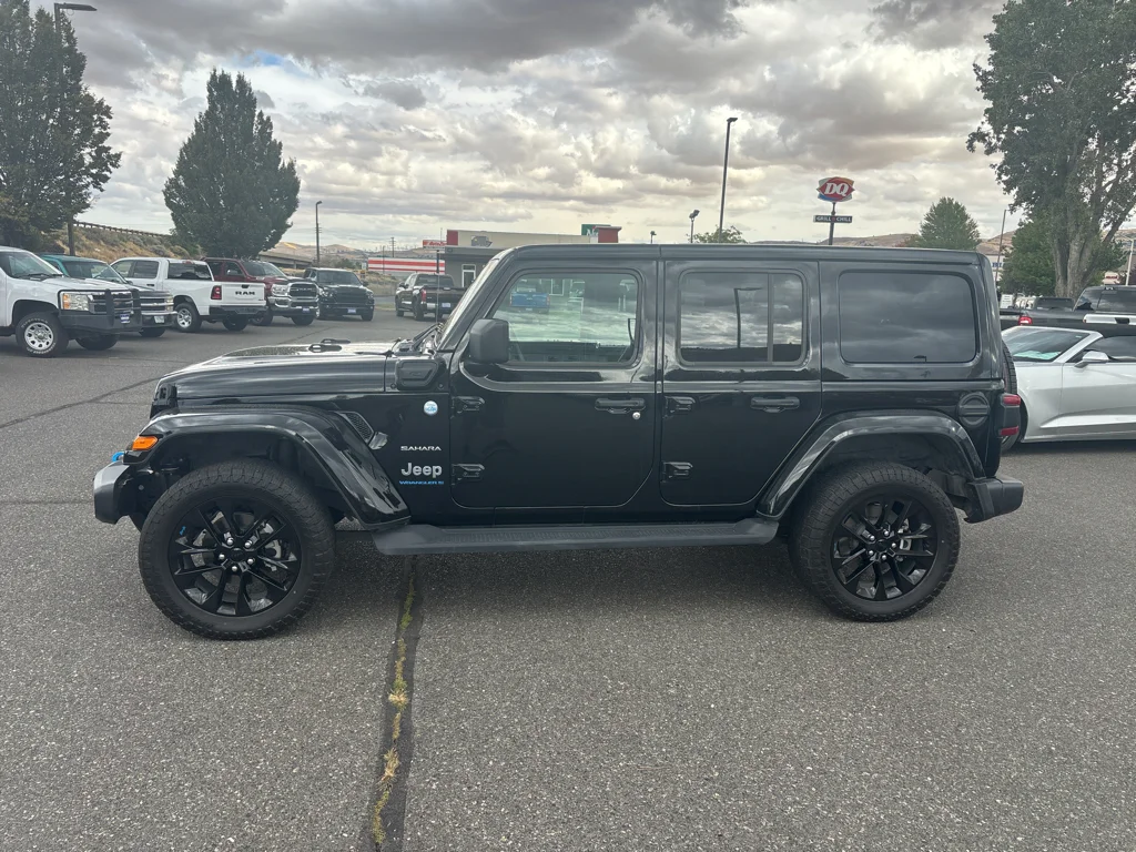 Used 2023 Black Clearcoat Jeep Sahara image 1