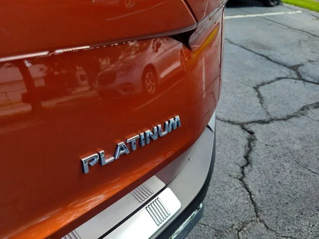 Used 2022 Orange Nissan Platinum image 7
