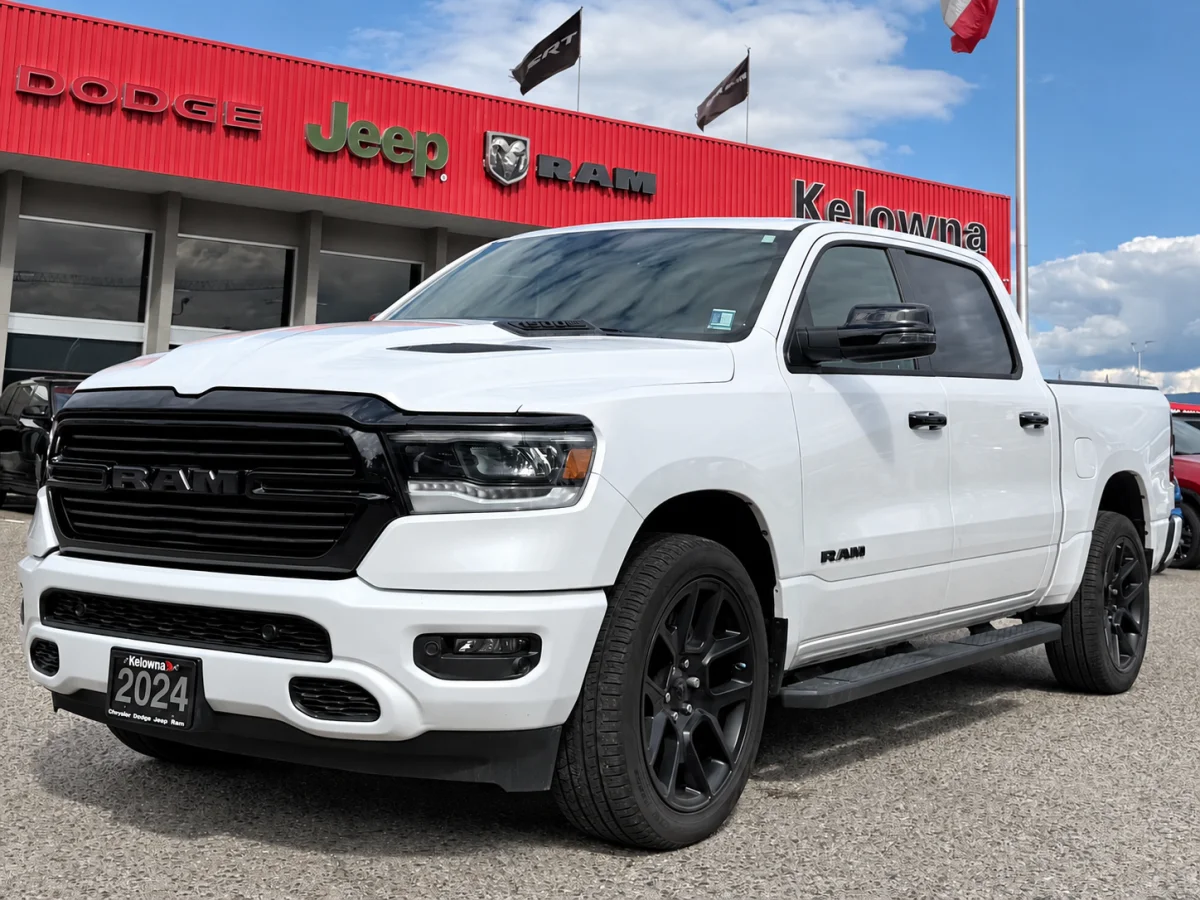 Used 2024 White RAM Laramie 4x4 Crew Cab image 1