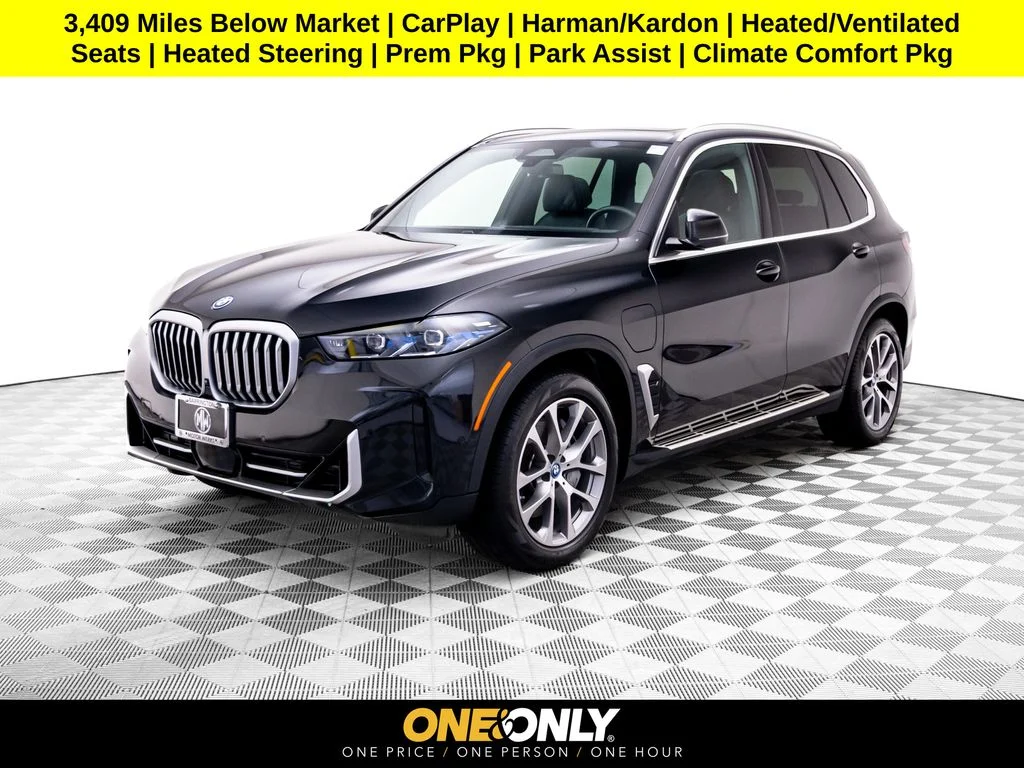 Used 2024 Black BMW xDrive50e image 1