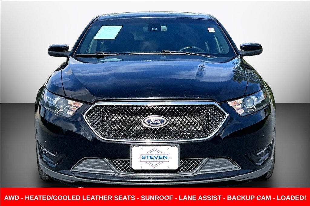 Used 2016 Black Ford SHO image 2
