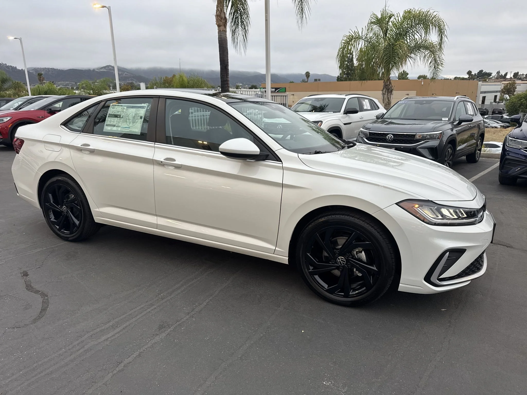 New 2026 Opal White Pearl Volkswagen SE image 1