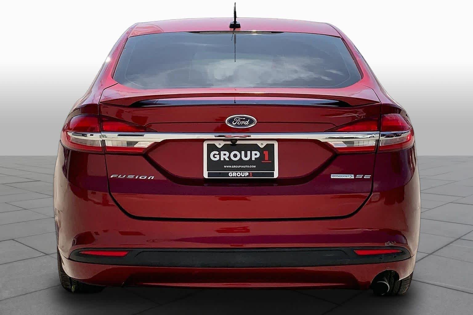 Used 2018 Ruby Red Metallic Tinted Clearcoat Ford SE image 5