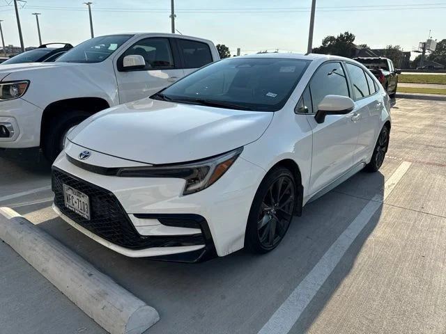 Used 2025 White Toyota LE image 1