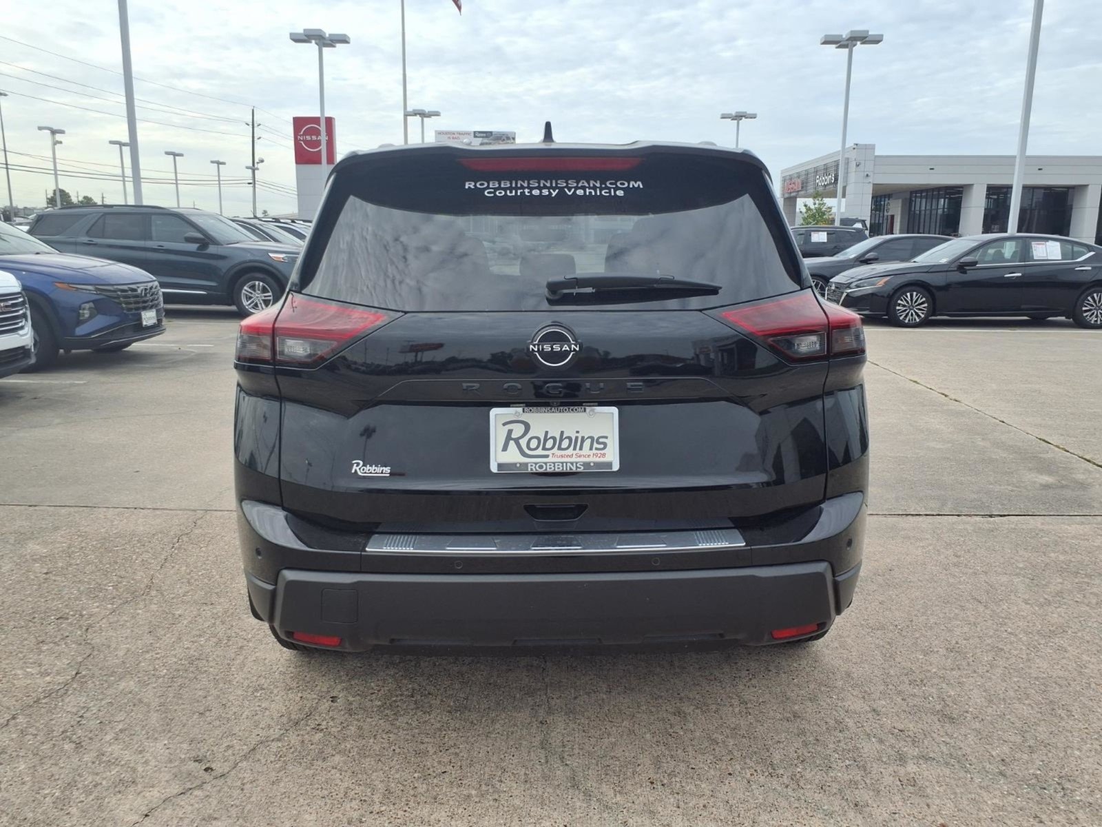 Certified Used 2026 Super Black Nissan Dark Armor image 7