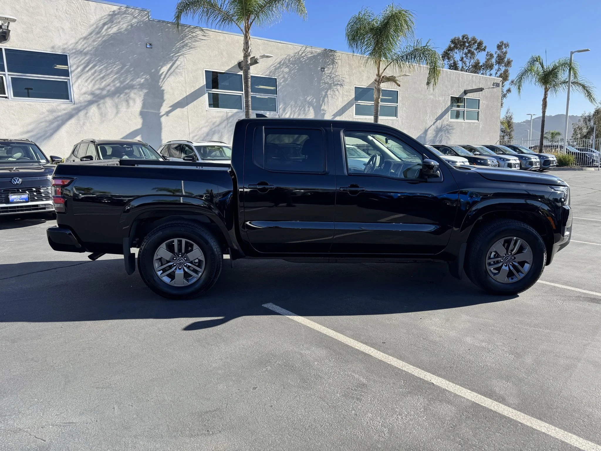 Used 2026 SUPER BLACK Nissan SV image 8