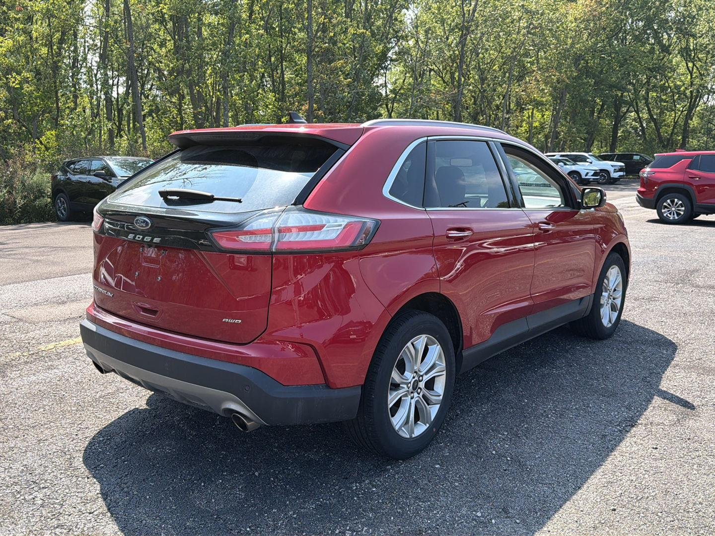 Used 2024 Rapid Red Metallic Tinted Clearcoat Ford Titanium image 3