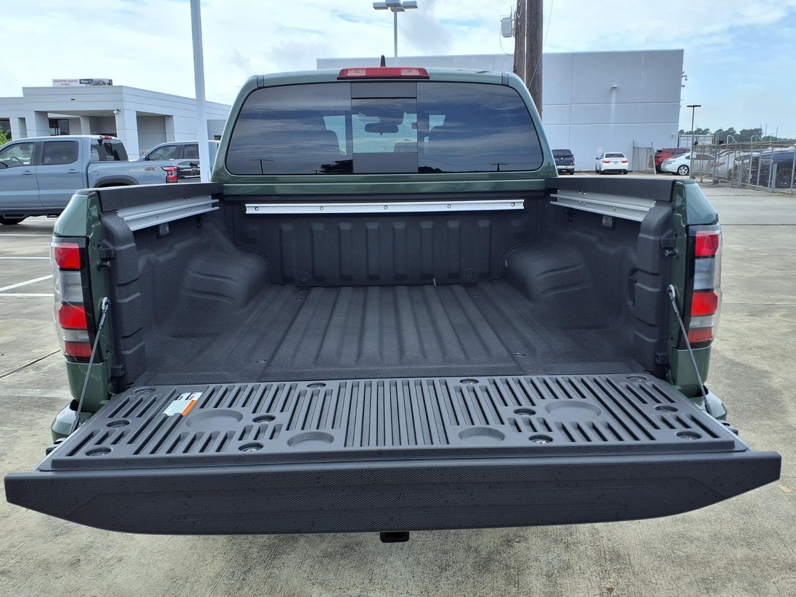 2026 Nissan Frontier SV Green at Robbins Nissan