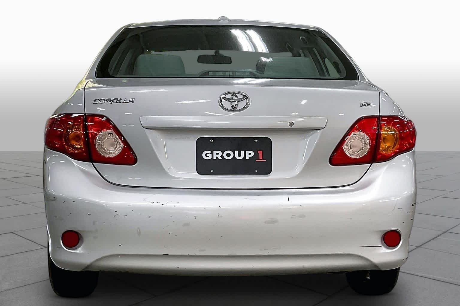 Used 2010 Classic Silver Metallic Toyota LE image 4