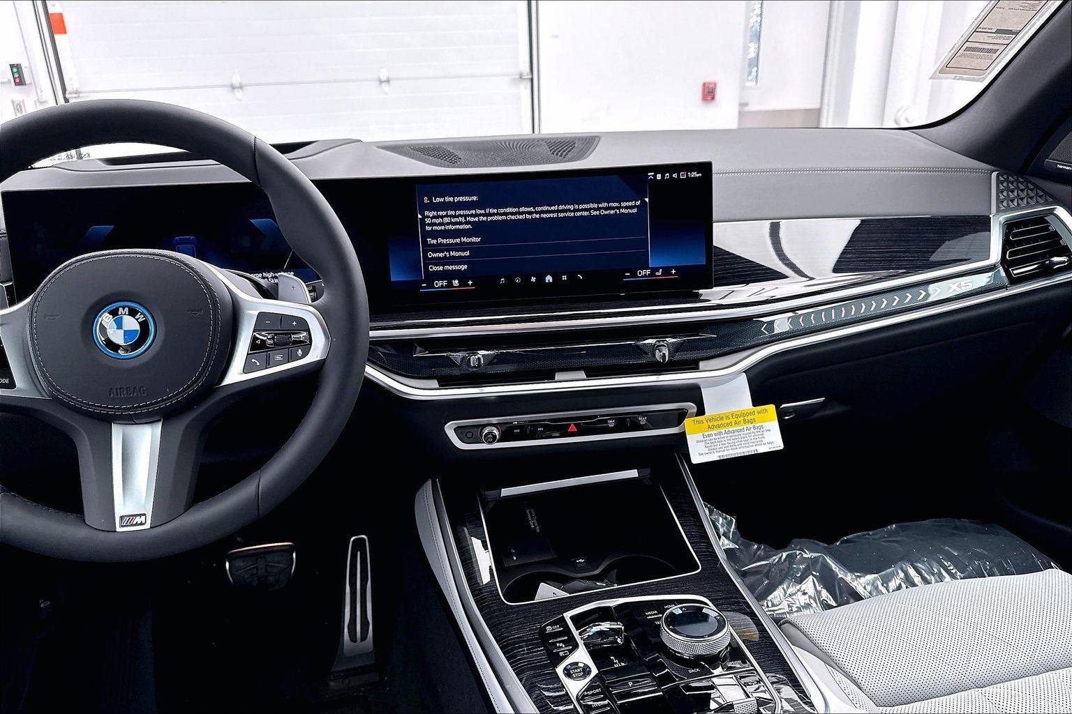 New 2026 Tanzanite Blue II Metallic BMW xDrive50e image 13