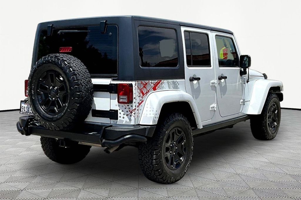 Used 2016 White Jeep Unlimited Sahara image 6