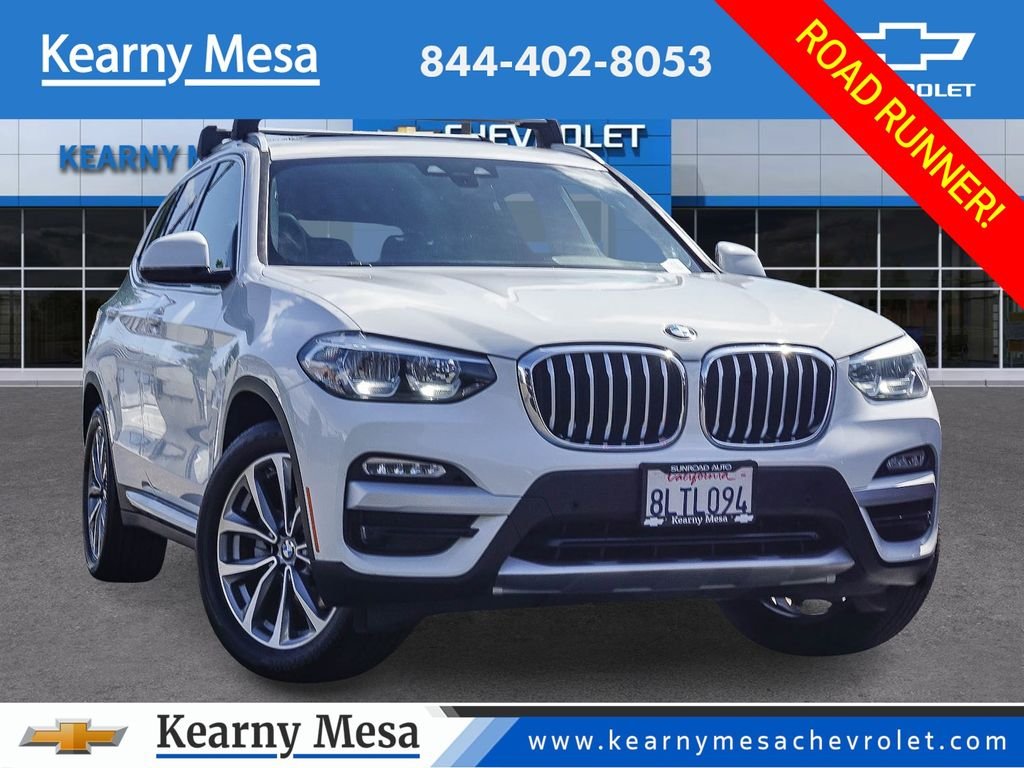 Used 2019 White BMW sDrive30i image 1