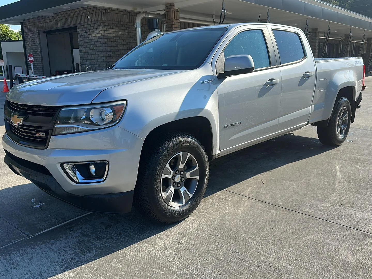 Used 2017 Silver Ice Metallic Chevrolet 4WD Z71 image 1