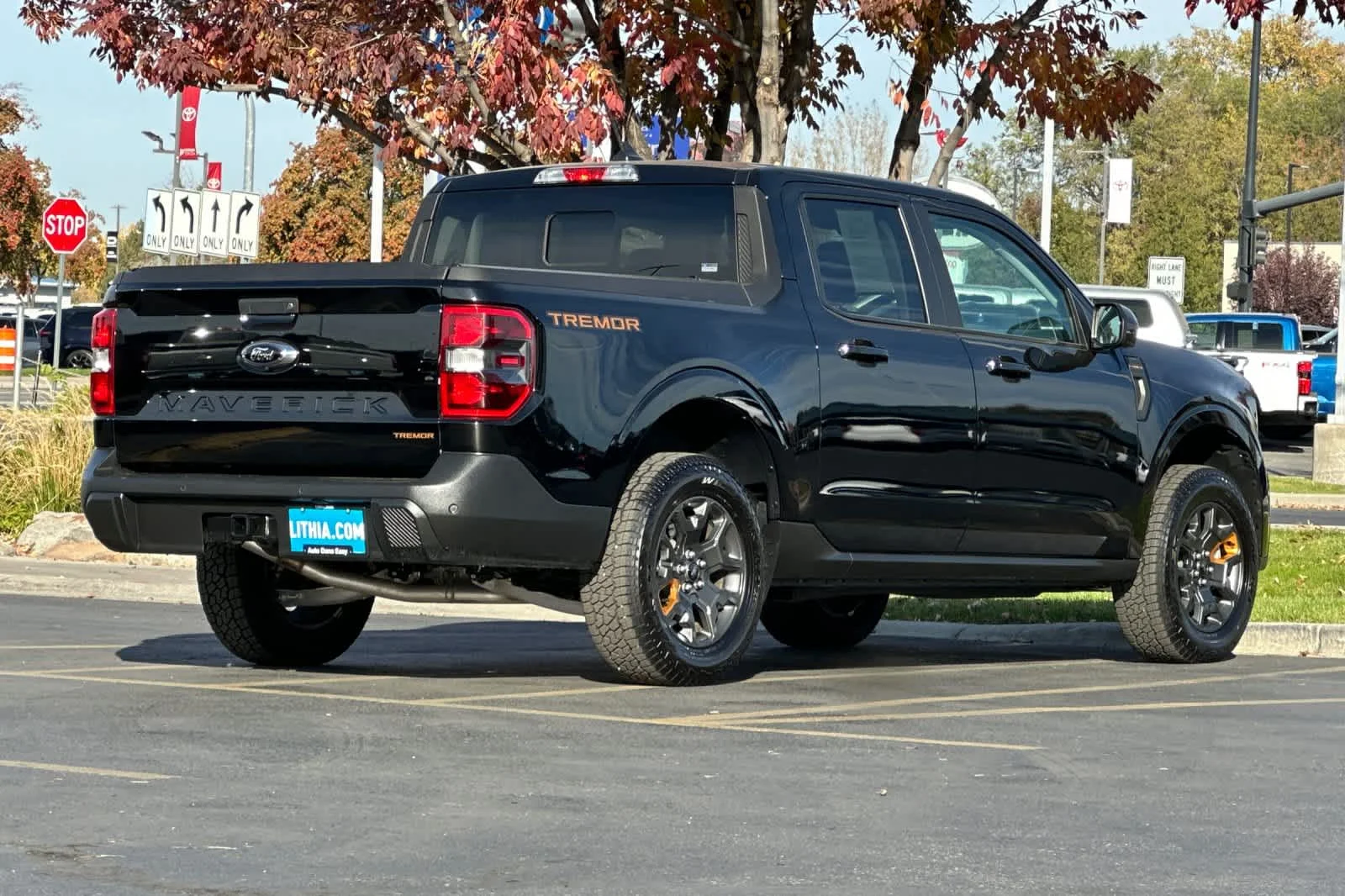 Certified Used 2024 Shadow Black Ford LARIAT Advanced image 2