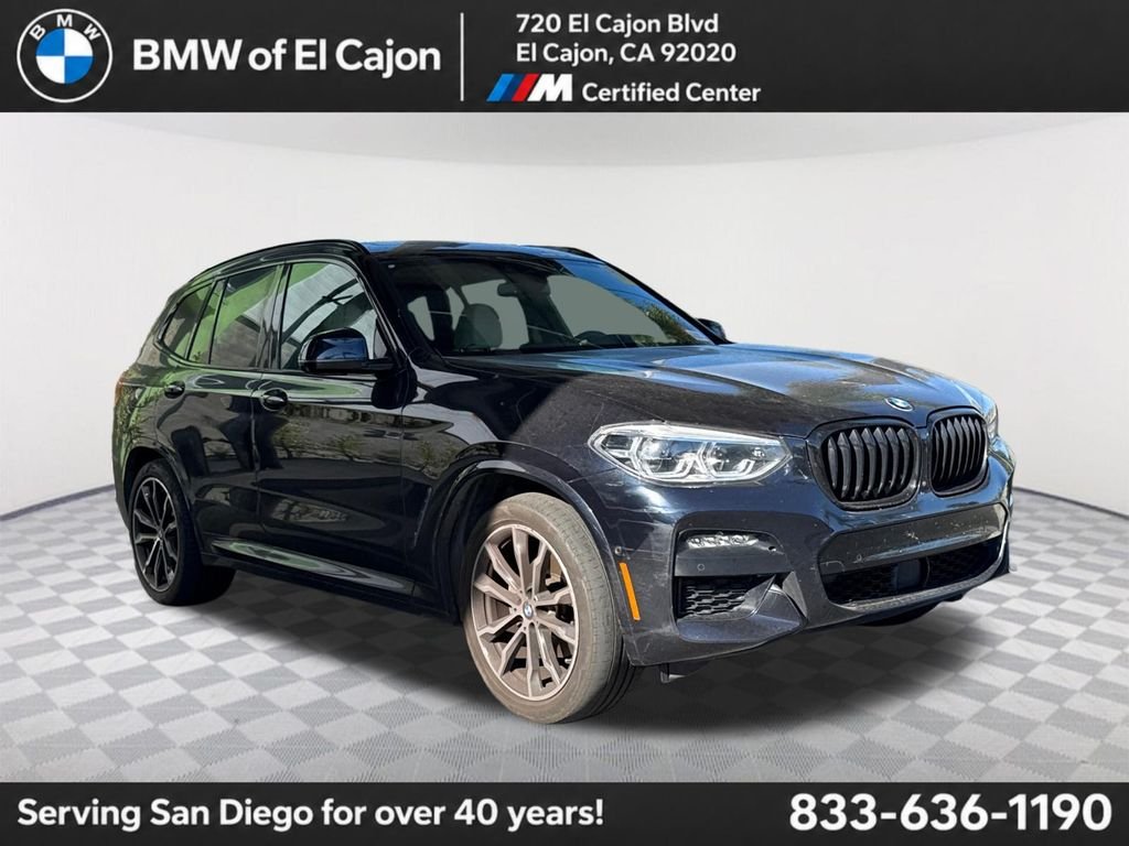 Used 2021 Carbon Black Metallic BMW sDrive30i image 1