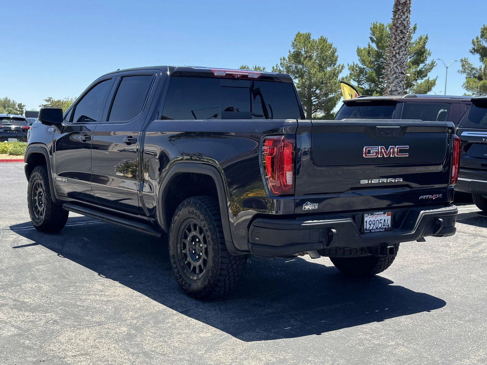 Used 2024 Titanium Rush Metallic GMC AT4X image 4