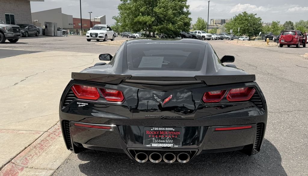 Used 2019 Black Chevrolet Grand Sport image 7
