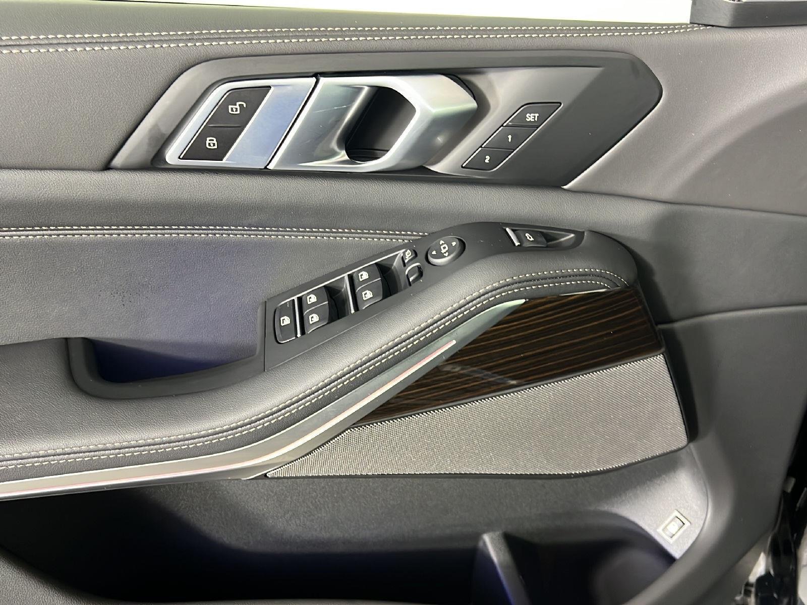 New 2026 Black Sapphire Metallic BMW xDrive50e image 11