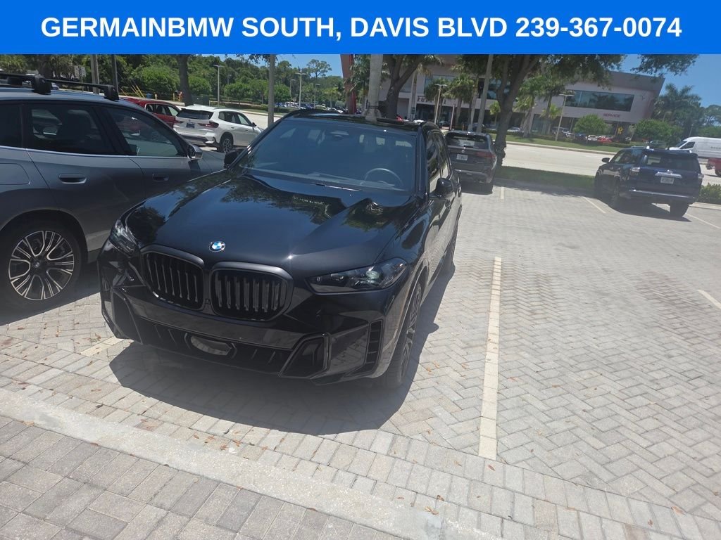 Certified Used 2026 Black Sapphire Metallic BMW sDrive40i image 1