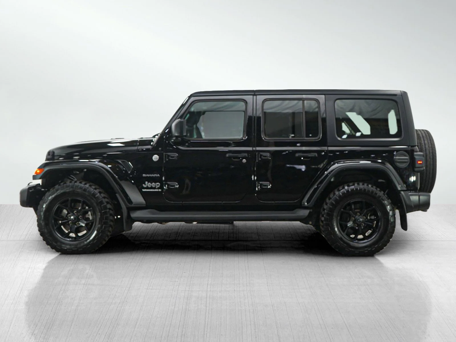 Used 2023 Jeep Wrangler 4-Door Sahara with VIN 1C4HJXEG5PW533242 for sale in Minneapolis, Minnesota