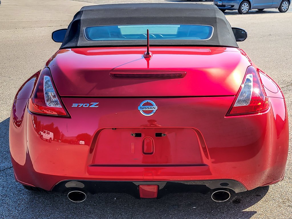 Used 2018 Passion Red Nissan Touring Sport image 7