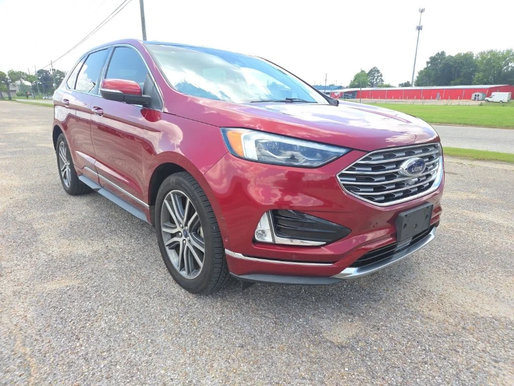 Used 2019 Ruby Red Metallic Ford Titanium image 1
