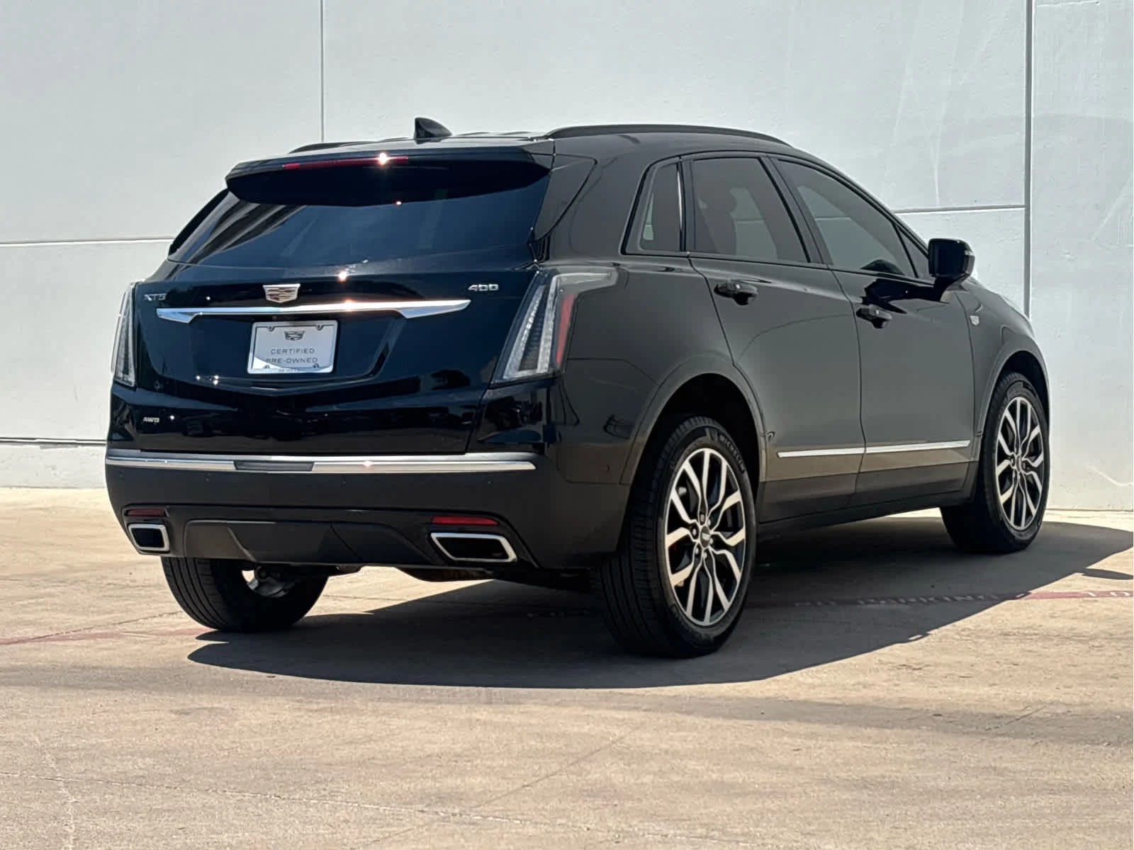 Used 2024 Stellar Black Metallic Cadillac Sport image 4
