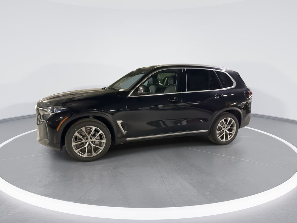 New 2026 Black Sapphire Metallic BMW xDrive40i image 4